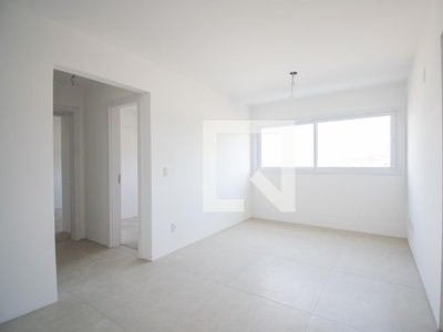 APARTAMENTO no 9º andar com 2 dormitórios e 1 garagem