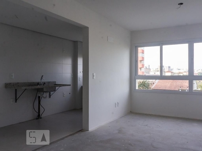 APARTAMENTO no 4º andar com 2 dormitórios e 2 garagens