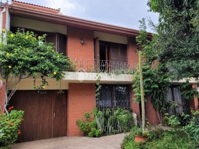 Casa com 6 quartos à venda na avenida monte cristo, 416, vila nova, porto alegre, 284 m2 por r$ 1.200.000