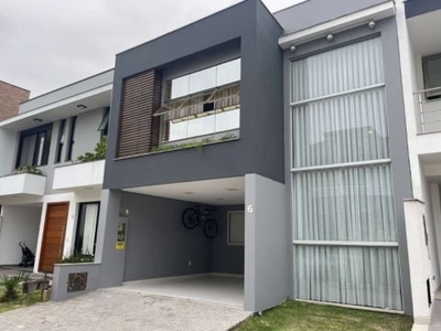 Casa em condomínio fechado com 3 quartos à venda em deltaville, biguaçu por r$ 1.390.000