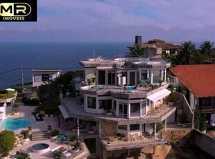 Casa em condomínio fechado com 4 quartos à venda em joá, rio de janeiro por r$ 32.000.000