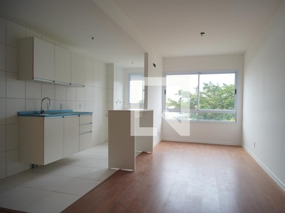 APARTAMENTO no 4º andar com 2 dormitórios e 1 garagem