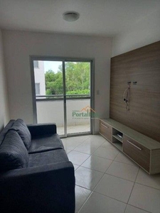 Apartamento com 2 dormitórios para alugar, 52 m² por R$ 1.500,00/mês - Castelândia - Serra