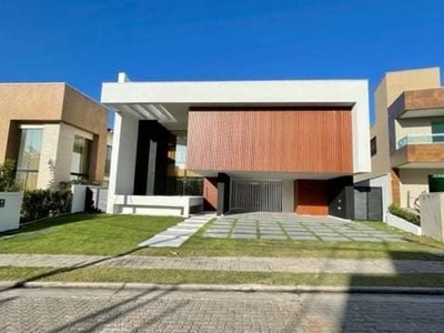 Casa de condomínio no alphaville fortaleza para venda tem 608 metros quadrados com 5 suítes.