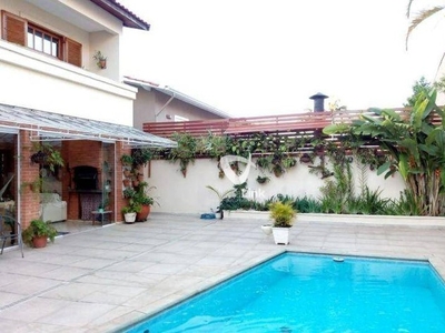 Casa com 4 dormitórios à venda, 453 m² por R$ 2.500.000,00 - Alphaville - Santana de Parna