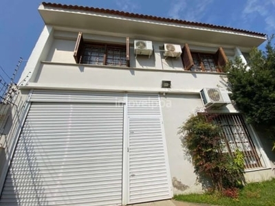 Casa com 4 quartos à venda na rua professor demophilo xavier, 93, glória, porto alegre por r$ 960.000