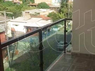 Apartamento com 2 dormitórios para alugar, 60 m² por R$ 1.310,00 - Camaquã - Porto Alegre