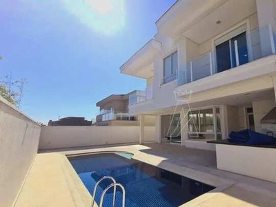 Casa com 4 dormitórios para alugar, 468 m² por R$ 23.835,22 - Alphaville - Santana de Parn