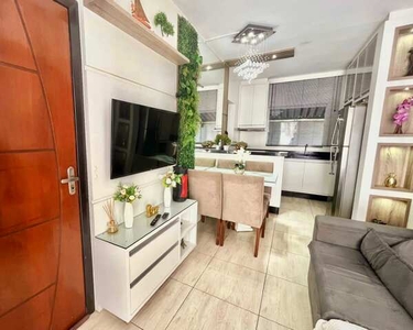 Apartamento térreo com 2 vagas e 2 dormitórios semi mobiliado no Bairro Iriríu por R$ 230m