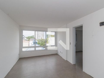 APARTAMENTO no 4º andar com 1 dormitório e 2 garagens