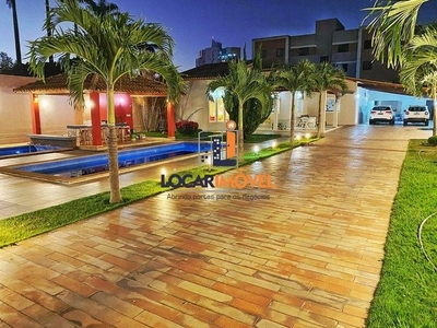Casa com 02 piscinas + bar molhado construída em terreno de 1000 m² em rua asfaltada no Al