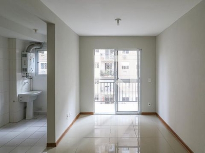 APARTAMENTO no 5º andar com 2 dormitórios e 1 garagem