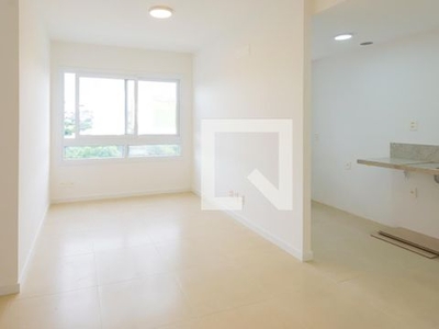 APARTAMENTO no 6º andar com 2 dormitórios e 1 garagem