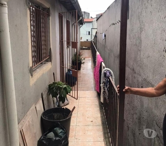 Vendo sobrado com 4 casas e 2 pontos comerciais