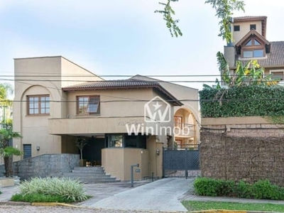 Casa com 3 dormitórios à venda, 434 m² por r$ 3.950.000,00 - três figueiras - porto alegre/rs