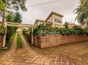 Casa 3 dorms à venda Rua Felipe Becker, Três Figueiras - Porto Alegre