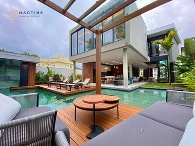 Casa com 5 dormitórios à venda, 361 m² por R$ 7.500.000,00 - Riviera Módulo 24 - Bertioga/