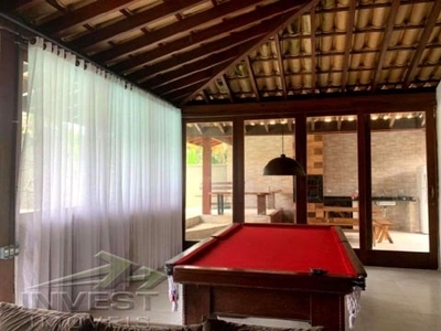 Casa em condomínio Ubatuba Country Club, com 450 m2. de terreno com excelente área de lazer.