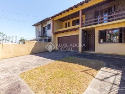 Casa em condomínio fechado com 3 quartos à venda na avenida ipê, 298, vila jardim, porto alegre, 192 m2 por r$ 900.000