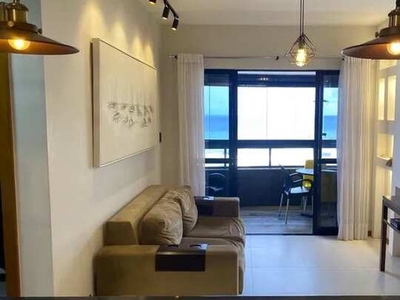 Apartamento quarto e sala mobiliado e decorado com vista mar em Armação