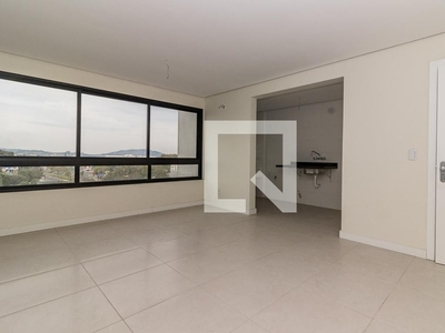 APARTAMENTO no 7º andar com 2 dormitórios e 1 garagem