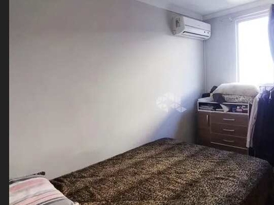 Apartamento dois dormitórios, sala de estar e jantar integradas, cozinha e uma vaga de gar