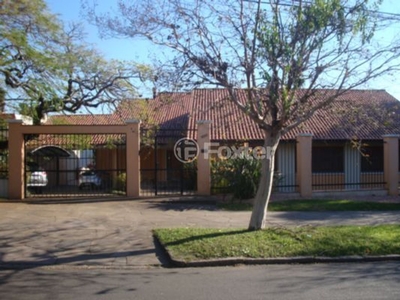 Casa 5 dorms à venda Avenida General Barreto Viana, Chácara das Pedras - Porto Alegre