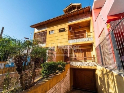 Casa com 3 quartos à venda na rua jair de moura calixto, ipanema, porto alegre por r$ 780.000