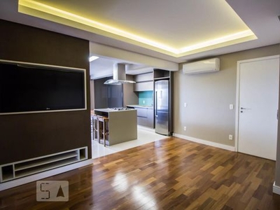 APARTAMENTO no 18º andar mobiliado com 2 dormitórios e 2 garagens