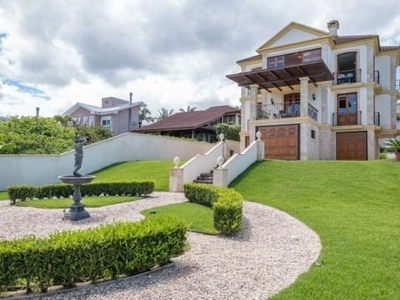 Casa em condomínio fechado com 3 quartos à venda na rodovia haroldo soares glavan, 3522, cacupé, florianópolis por r$ 5.000.000