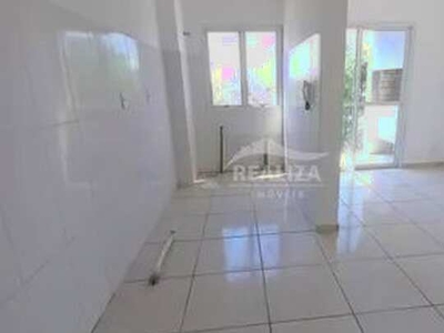 Apartamento com sacada e churrasqueira