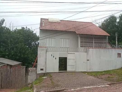 Casa com 2 suítes próximo a Protásio Alves