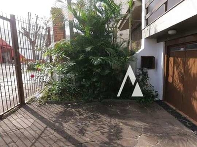 Casa com 3 dormitórios para alugar, 252 m² por R$ 4.326,06/mês - Medianeira - Porto Alegre