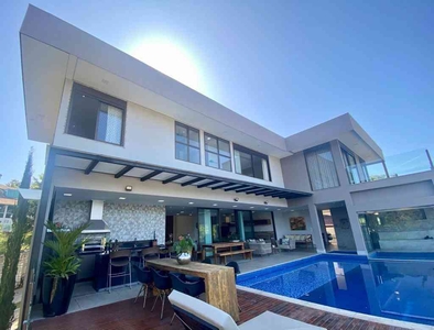 Casa em Condomínio com 4 quartos à venda no bairro Estância das Amendoeiras, 450m²