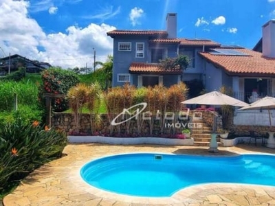 Casa com 4 dormitórios à venda, 242 m² por r$ 1.750.000,00 - condomínio residencial alpes de guararema - guararema/sp