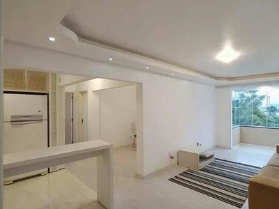 Apartamento com 2 dormitórios para alugar, 74 m² por R$ 2.547,21/mês - Capoeiras - Florian