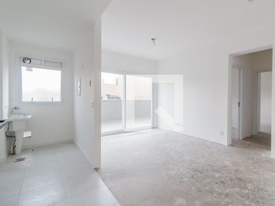 APARTAMENTO no 7º andar com 2 dormitórios e 1 garagem