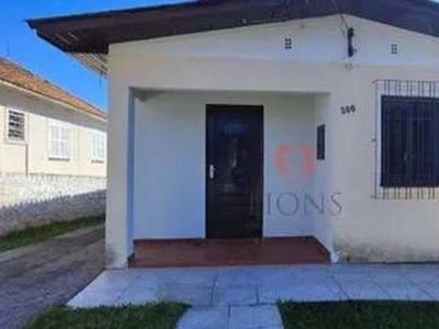 Casa com 3 dormitórios para alugar, 110 m² por R$ 1.700,00/mês - Centro - Gravataí/RS