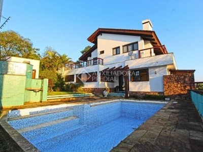 Casa com 3 quartos à venda na rua dona lida monteiro, 180, teresópolis, porto alegre, 601 m2 por r$ 1.300.000