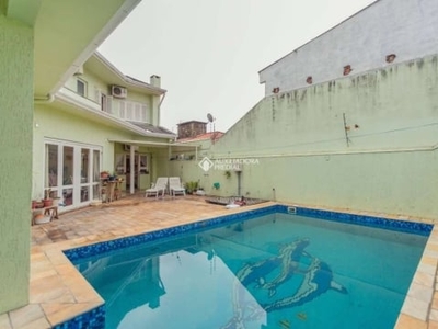 Casa com 4 quartos à venda na rua alfredo miranda obino, 90, jardim itu sabará, porto alegre, 350 m2 por r$ 2.089.900