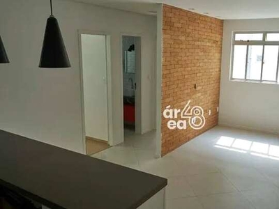 Apartamento com 2 dormitórios à venda, 56 m² por R$ 339.000,00 - Barreiros - São José/SC