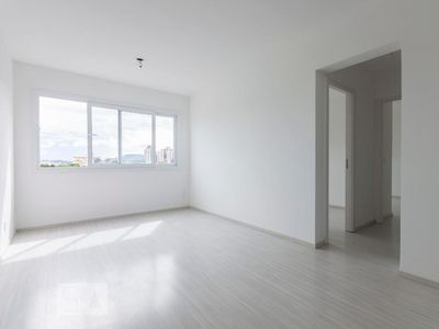 APARTAMENTO no 7º andar com 2 dormitórios e 1 garagem