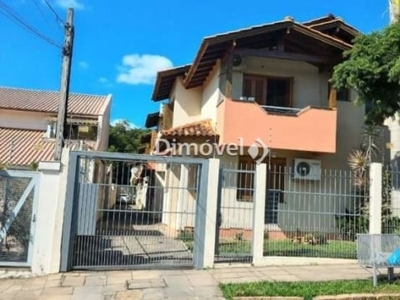 Casa em condomínio fechado com 3 quartos para alugar na PADRE JOAO BATISTA REUS, 2475, Tristeza, Porto Alegre por R$ 2.300