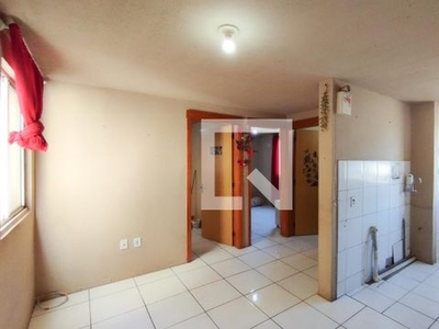 APARTAMENTO no 1º andar com 2 dormitórios e 1 garagem