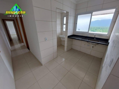 Apartamento com 2 dormitórios à venda, 55 m² por R$ 330.000,00 - Caiçara - Praia Grande/SP