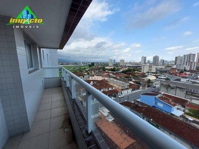 Apartamento com 2 dormitórios à venda, 63 m² por R$ 320.000,00 - Caiçara - Praia Grande/SP