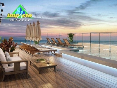 Apartamento com 2 dormitórios à venda, 65 m² por R$ 470.000,00 - Maracanã - Praia Grande/S