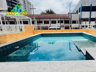 Apartamento com 2 dormitórios à venda, 67 m² por R$ 450.000,00 - Caiçara - Praia Grande/SP
