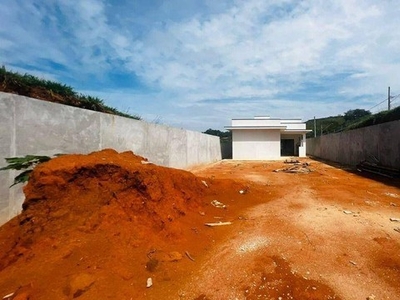 Casa com 3 dormitórios à venda, 145 m² por R$ 1.200.000 - Condomínio Cataguá Way Sul - Tau