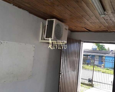 Casa de 2 dormitórios, 1 banheiro com garagem no Bairro Guajuviras, Canoas